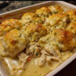 I've always made the chicken and dumplings I was raised on with big fluffy dumplings cooked on top of the broth from the chicken. LOVE the stuff, but I found this chicken an dumpling casserole recipe and tried it last night...OMG, SO quick and easy and DELICIOUS!!!! Recipe: pulled chicken from a rotisserie chicken (no skin) 1 stick of butter, melted 1 cup milk 1 cup self-rising flour (must be self-rising) 2 cups chicken broth 1 can condensed cream of chicken soup Preheat oven 375° Spread chicken in a 9x13 baking dish Pour butter evenly over chicken Season with a little salt and pepper In med bowl whisk together flour and milk. Slowly pour evenly over chicken. Do not stir! In same bowl, whisk together chicken broth and chicken soup. Slowly pour into baking pan. Do not stir. Dumplings form as it bakes. Bake uncovered for 45 mins. Let sit for minimum of 5 mins before serving, allowing dumplings to finish forming. The longer it sits the more dumplings you get. Just as good the second day, also!!! Enjoy